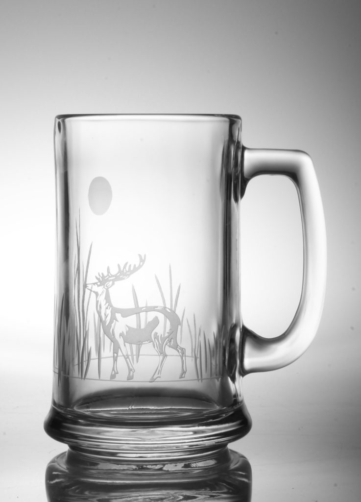 Beer mug with etched deer design